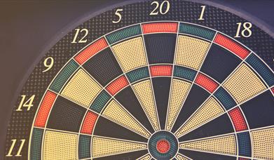 Red green and yellow coloured dartboard