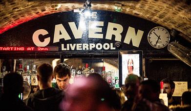 'Cavern Liverpool' in white paint above the bar