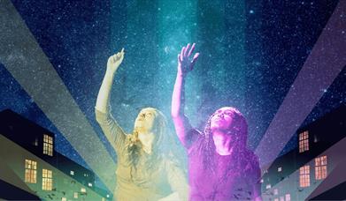 Two people reaching up to the sky with beams of light and houses behind them