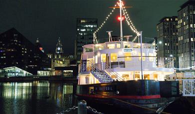 Boat on Canning Dock with Liver Building in the back.