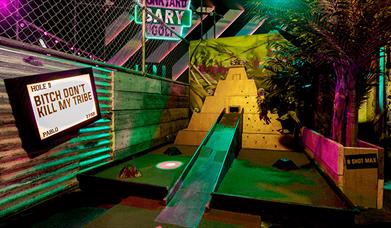 Bitch don't kill my tribe quote at Junkyard Golf Liverpool