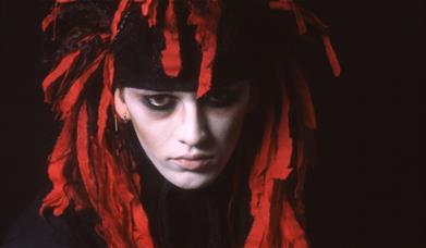 Pete Burns lookalike.