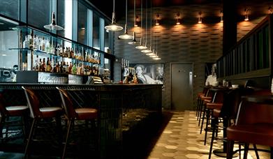 A dining area with a bar.