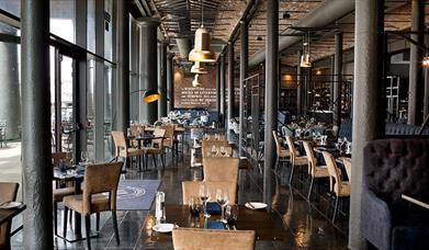 Inside the Stanleys Bar and Grill. It is a converted warehouse and the large vaulted ceilings are supporting beams are a key feature. There are huge f