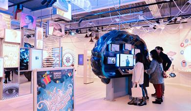 A family play on screens at Eureka Science & Discovery