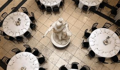 Walker Art Gallery event space set up in cabaret style.