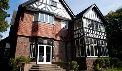 Exterior of The Riverhill Hotel, set in the wooded surroundings of Oxton village on the Wirral peninsula.