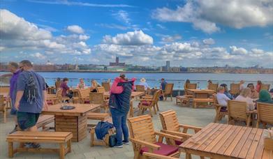 a place to relax with a view of Liverpools waterfront from across the River Mersey